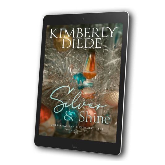 Silver & Shine ebook by Kimberly Diede displayed on a tablet, with colorful vintage Christmas ornaments on a silver aluminum tree on the cover.