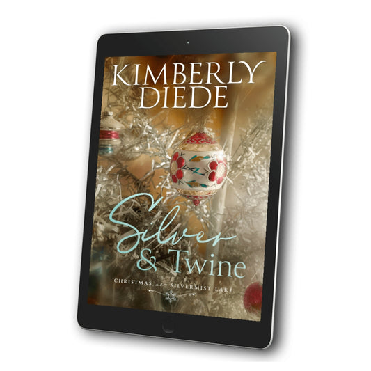 Silver & Twine ebook by Kimberly Diede displayed on a tablet, with vintage glass Christmas ornaments, including a floral ornament, on a silver tree on the cover.